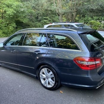 AGV Mobile Car Detailing — blue sedan wagon detailed on forest road
